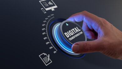 Digital transformation using information technologies as cloud computing, business process management and automation to improve efficiency. Concept with hand turning knob to increase data digitization