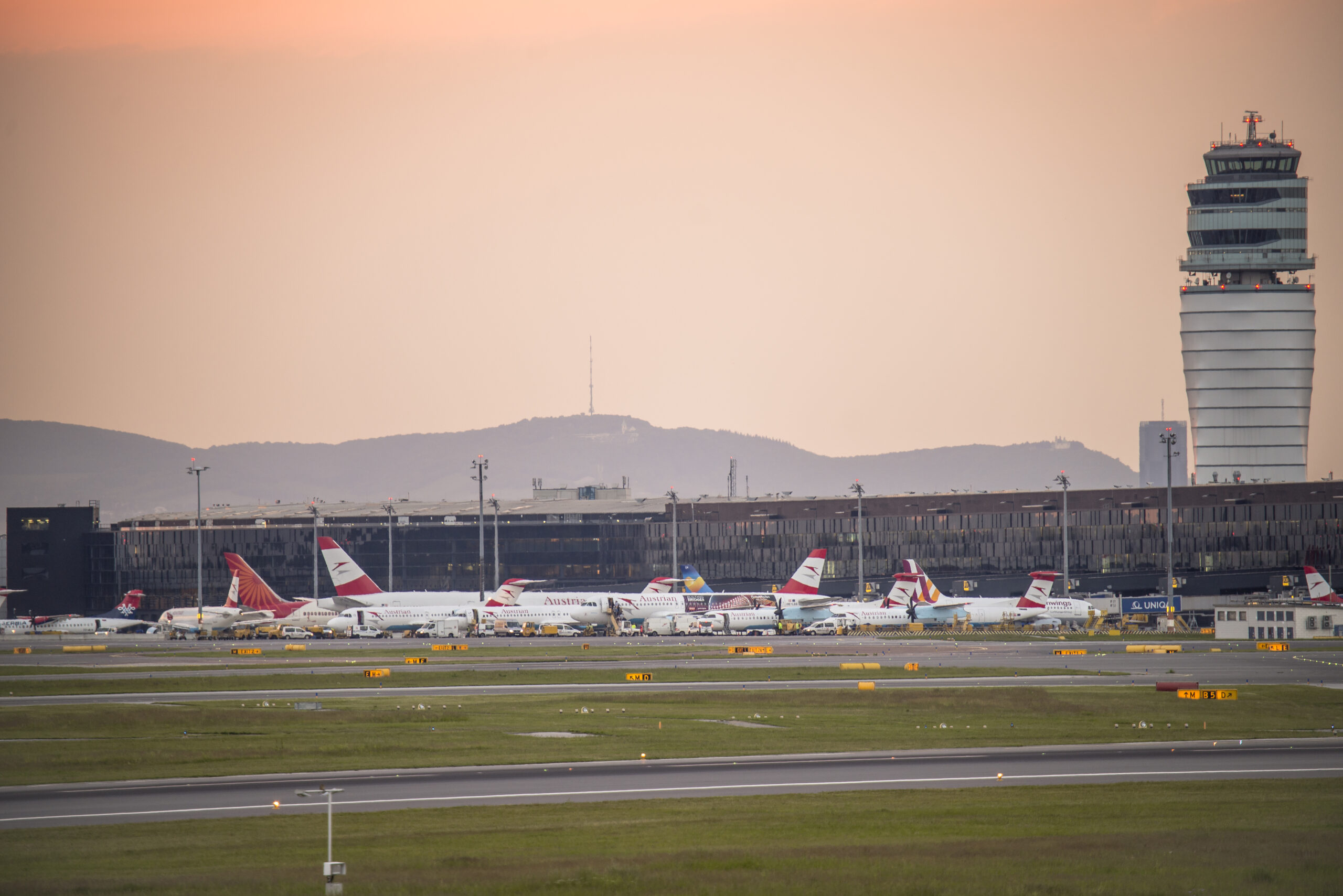 Schwechat, Austria - May 18, 2016: Schwechat airport with control tower and terminal